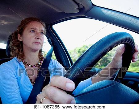 Women driving View Large Photo Image Stock Photography - Women driving. Fotosearch