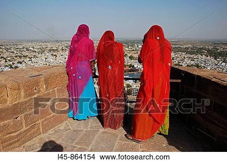 Women enjoying view from Mehrangarh Fort in Jodhpur India View Large Photo Image Picture - Women enjoying view from Mehrangarh Fort in Jodhpur India. Fotosearch