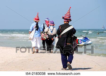 Women from northern Thailand selling souvenirs on the beach of Hua Hin View Large Photo Image Stock Photo - Women from northern Thailand selling souvenirs on the beach of Hua Hin. Fotosearch