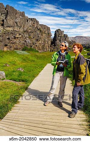 women in Rift Valley. Pingvellir National Park. Golden Circle. Iceland, Europe. View Large Photo Image Stock Image - women in Rift Valley. Pingvellir National Park. Golden Circle. Iceland, Europe.. Fotosearch