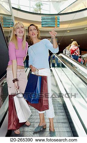 Women in shopping center View Large Photo Image Stock Image - Women in shopping center. Fotosearch