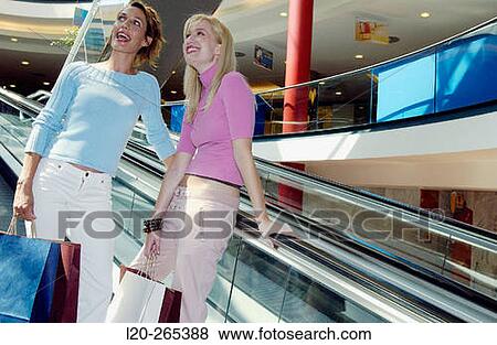 Women in shopping center View Large Photo Image Stock Photo - Women in shopping center. Fotosearch