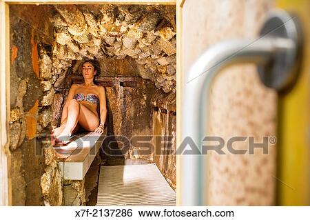 women in stove (natural sauna). Caldes de Boi Spa, Bo? valley. Lleida province. Catalonia. Spain. View Large Photo Image Stock Photograph - women in stove (natural sauna). Caldes de Boi Spa, Bo? valley. Lleida province. Catalonia. Spain.. Fotosearch