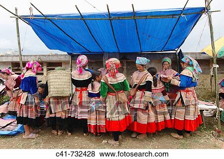 Women in traditional costume at market, Bac Ha. Lao Cai, Vietnam. View Large Photo Image Stock Photo - Women in traditional costume at market, Bac Ha. Lao Cai, Vietnam.. Fotosearch