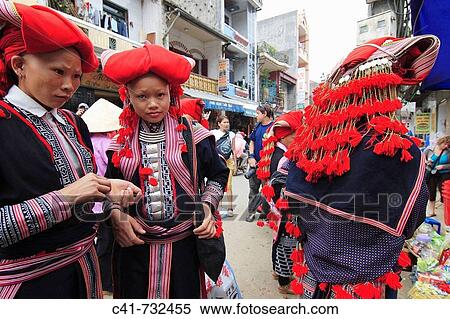 Women in traditional costume at market, Sa Pa. Lao Cai, Vietnam View Large Photo Image Stock Photography - Women in traditional costume at market, Sa Pa. Lao Cai, Vietnam. Fotosearch