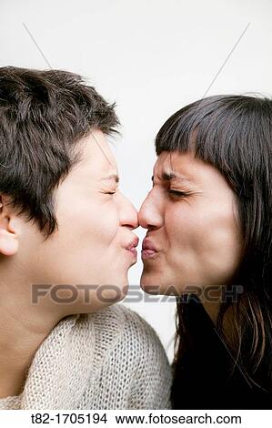 Women kissing View Large Photo Image Picture - Women kissing. Fotosearch