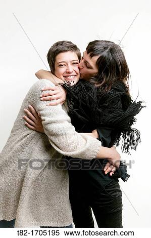 Women kissing View Large Photo Image Stock Photography - Women kissing. Fotosearch