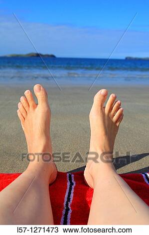 women lying on sandy beach, Sutherland, Scotlandd View Large Photo Image Stock Image - women lying on sandy beach, Sutherland, Scotlandd. Fotosearch