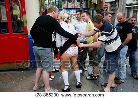 Women on a hen night walking down fleet street, Liverpool, England, UK View Large Photo Image Stock Image - Women on a hen night walking down fleet street, Liverpool, England, UK. Fotosearch