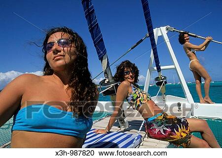 women on sailing boat, Grenadines Islands, Winward Islands, Lesser Antilles, Caribbean Sea View Large Photo Image Stock Image - women on sailing boat, Grenadines Islands, Winward Islands, Lesser Antilles, Caribbean Sea. Fotosearch
