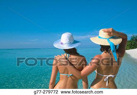 Women on the beach in Ari Atoll. Maldives View Large Photo Image Stock Image - Women on the beach in Ari Atoll. Maldives. Fotosearch
