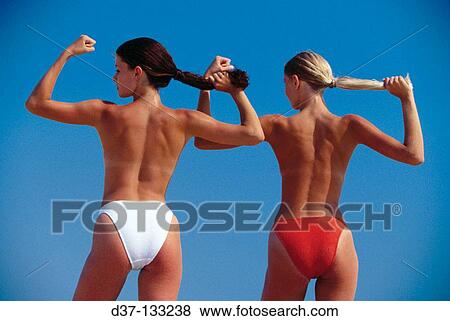 Women on the beach View Large Photo Image Stock Photo - Women on the beach. Fotosearch