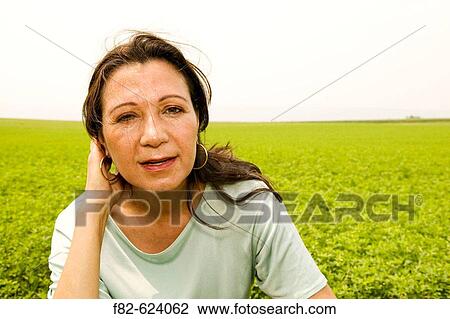 Stock Image - Women outside home. Fotosearch
