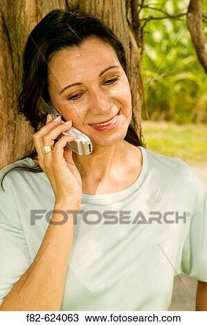 Women outside home View Large Photo Image Stock Image - Women outside home. Fotosearch