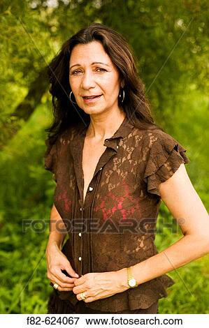 Women outside home View Large Photo Image Stock Photo - Women outside home. Fotosearch