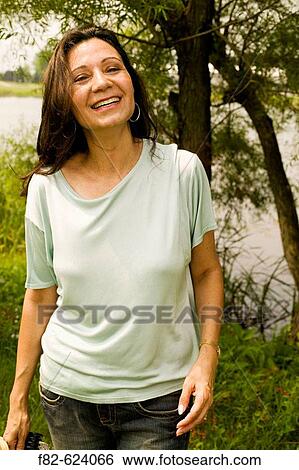 Women outside home View Large Photo Image Stock Photograph - Women outside home. Fotosearch