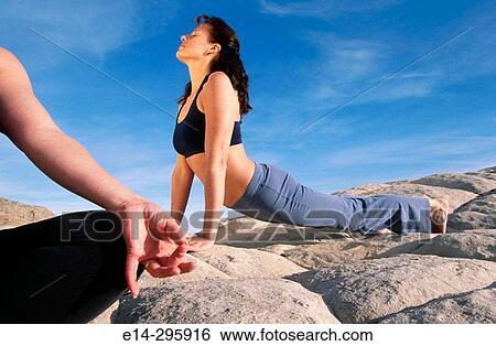Women practicing yoga at Snow Canyon State Park. Utah, USA View Large Photo Image Stock Photograph - Women practicing yoga at Snow Canyon State Park. Utah, USA. Fotosearch