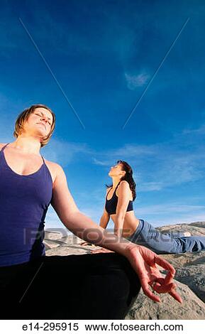 Women practicing yoga at Snow Canyon State Park. Utah, USA View Large Photo Image Stock Photography - Women practicing yoga at Snow Canyon State Park. Utah, USA. Fotosearch