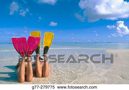 Women resting on a beach in Ari Atoll. Maldives View Large Photo Image Stock Photography - Women resting on a beach in Ari Atoll. Maldives. Fotosearch