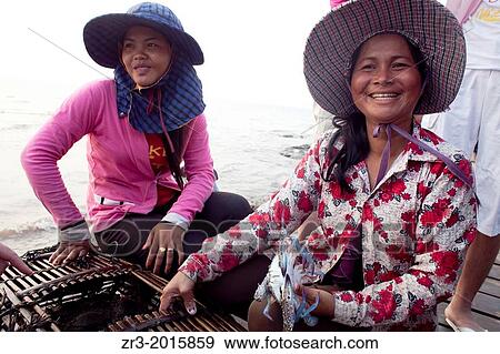 Women sell crabs at the crab market in the resort town of Kep, Cambodia. View Large Photo Image Stock Photo - Women sell crabs at the crab market in the resort town of Kep, Cambodia.. Fotosearch