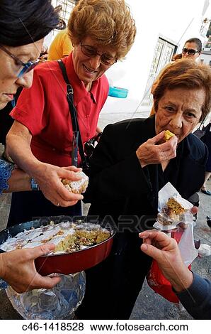 Women sharing cakes after church, Plaka District Athens Greece View Large Photo Image Stock Photo - Women sharing cakes after church, Plaka District Athens Greece. Fotosearch
