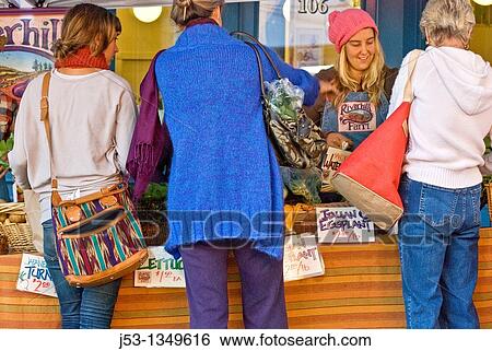 Women shopping at outdoor farmer's market, Nevada City, California View Large Photo Image Stock Photograph - Women shopping at outdoor farmer's market, Nevada City, California. Fotosearch