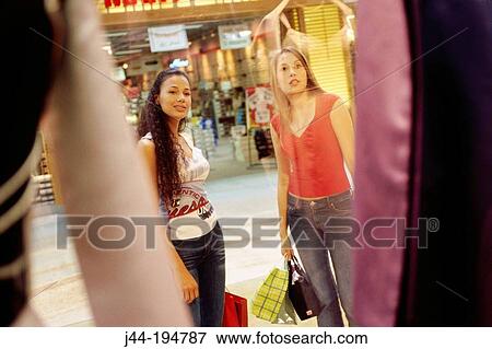 Women shopping View Large Photo Image Stock Photo - Women shopping. Fotosearch