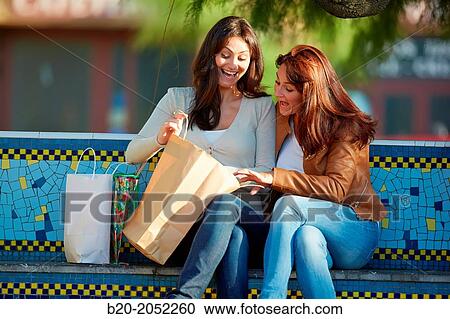 Women sisters 35 and 40 years shopping on the street. Donostia. San Sebastian. Gipuzkoa. Basque Country. Spain. View Large Photo Image Stock Image - Women sisters 35 and 40 years shopping on the street. Donostia. San Sebastian. Gipuzkoa. Basque Country. Spain.. Fotosearch