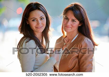Women sisters 35 and 40 years. Donostia. San Sebastian. Gipuzkoa. Basque Country- Spain. View Large Photo Image Stock Photography - Women sisters 35 and 40 years. Donostia. San Sebastian. Gipuzkoa. Basque Country- Spain.. Fotosearch
