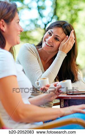 Women sisters 35 and 40 years taking coffee on a terrace. Donostia. San Sebastian. Gipuzkoa. Basque Country- Spain. View Large Photo Image Stock Image - Women sisters 35 and 40 years taking coffee on a terrace. Donostia. San Sebastian. Gipuzkoa. Basque Country- Spain.. Fotosearch