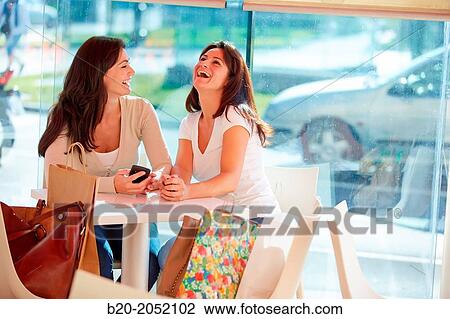 Women sisters 35 and 40 years taking coffee on a terrace. Donostia. San Sebastian. Gipuzkoa. Basque Country- Spain. View Large Photo Image Stock Image - Women sisters 35 and 40 years taking coffee on a terrace. Donostia. San Sebastian. Gipuzkoa. Basque Country- Spain.. Fotosearch