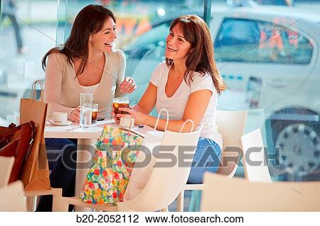 Women sisters 35 and 40 years taking coffee on a terrace. Donostia. San Sebastian. Gipuzkoa. Basque Country- Spain. View Large Photo Image Stock Image - Women sisters 35 and 40 years taking coffee on a terrace. Donostia. San Sebastian. Gipuzkoa. Basque Country- Spain.. Fotosearch