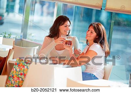 Women sisters 35 and 40 years taking coffee on a terrace. Donostia. San Sebastian. Gipuzkoa. Basque Country- Spain. View Large Photo Image Stock Image - Women sisters 35 and 40 years taking coffee on a terrace. Donostia. San Sebastian. Gipuzkoa. Basque Country- Spain.. Fotosearch