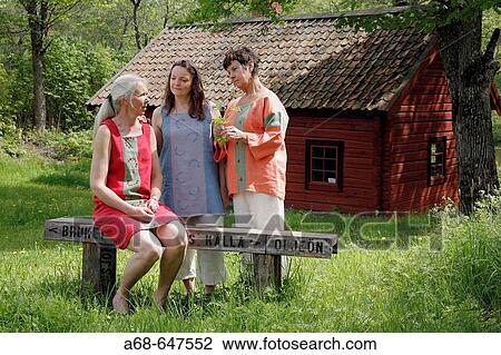 Stock Image - Women talking. Fotosearch