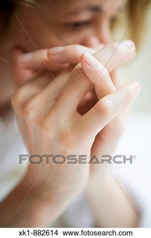 Picture - Women, thinking or meditating. Fotosearch