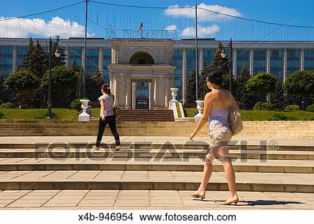 Picture - Women walking in front of Arc de Triomphe in Chisinau Moldova Europe. Fotosearch