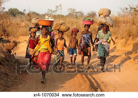 Picture - Women walking to Bekopaka, Toliara, Madagascar. Fotosearch