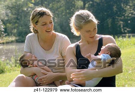 Women with babies View Large Photo Image Stock Photo - Women with babies. Fotosearch