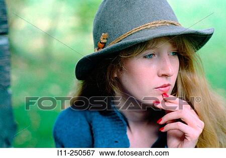 Women with grey slouch hat and blue sweater View Large Photo Image Stock Photo - Women with grey slouch hat and blue sweater. Fotosearch