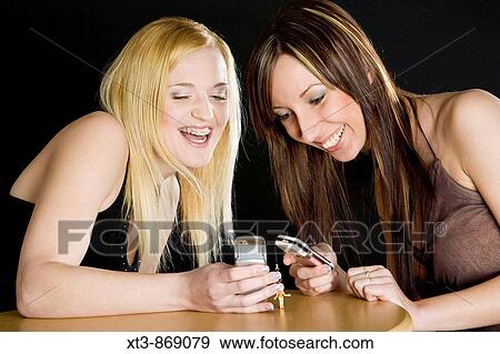 women with mobile phones View Large Photo Image Stock Photo - women with mobile phones. Fotosearch