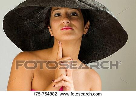 Women with pamela View Large Photo Image Stock Image - Women with pamela. Fotosearch