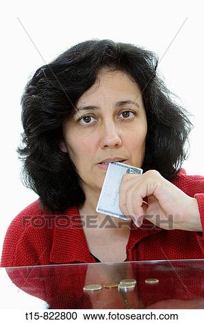 Stock Image - women worry about her financial future. Fotosearch