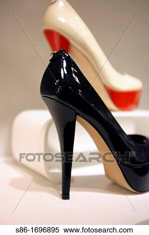 Stock Photography - Women's Black Patent Very High Heeled Shoes. Fotosearch