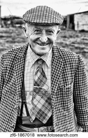 Wonderful old man age 86 at his isolated farm in Isle of Skye in Scotland dressed in wool and tie coming back from shopping for groceries View Large Photo Image Stock Photo - Wonderful old man age 86 at his isolated farm in Isle of Skye in Scotland dressed in wool and tie coming back from shopping for groceries. Fotosearch