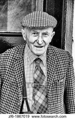 Wonderful old man age 86 at his isolated farm in Isle of Skye in Scotland dressed in wool and tie coming back from shopping for groceries View Large Photo Image Stock Photo - Wonderful old man age 86 at his isolated farm in Isle of Skye in Scotland dressed in wool and tie coming back from shopping for groceries. Fotosearch