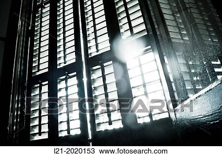 Wood blind. Light entering inside. View Large Photo Image Stock Image - Wood blind. Light entering inside.. Fotosearch