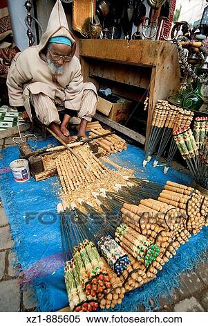 Stock Photography - Wood carver in the souk, Marrakech, Morocco. Fotosearch