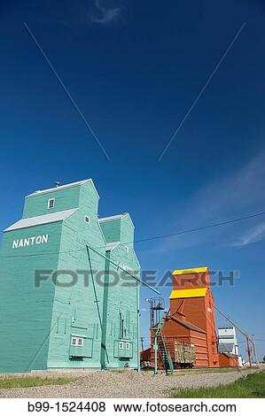WOOD FRAMED GRAIN ELEVATORS NANTON ALBERTA CANADA View Large Photo Image Stock Photo - WOOD FRAMED GRAIN ELEVATORS NANTON ALBERTA CANADA. Fotosearch