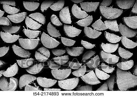 Wood pile with a split firewood View Large Photo Image Stock Image - Wood pile with a split firewood. Fotosearch