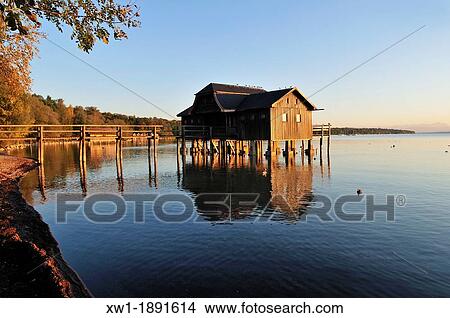 wooden boathouse on the shore of Lake Ammer, Stegen, Ammersee, Upper Bavaria, Germany, Europe View Large Photo Image Picture - wooden boathouse on the shore of Lake Ammer, Stegen, Ammersee, Upper Bavaria, Germany, Europe. Fotosearch